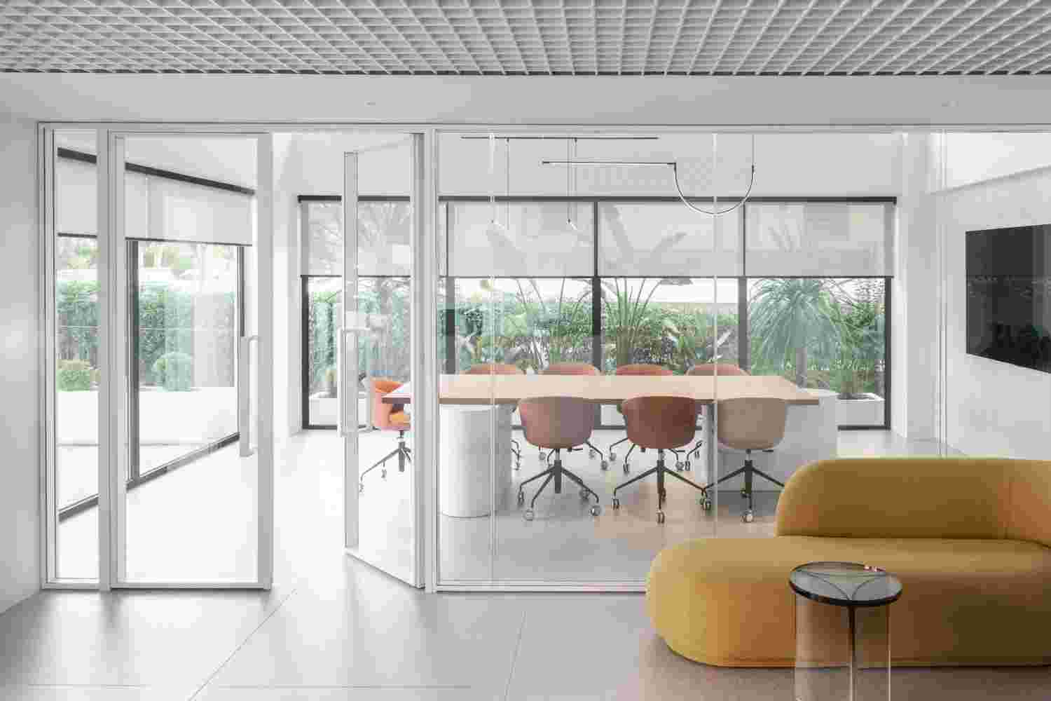 Spacious lounge with modern furniture.