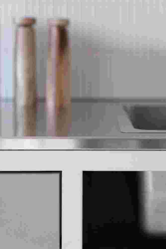 Kitchen countertop showcasing various materials and textures.