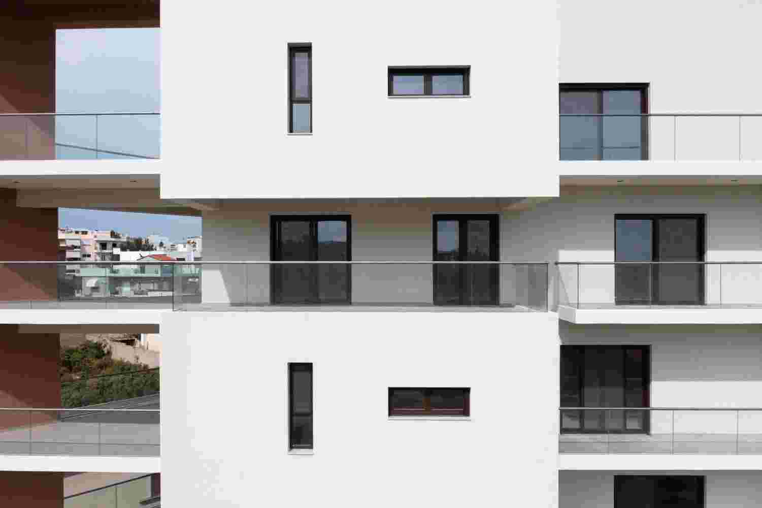 Angular architectural composition of Prismatic residential project in suburban Athens context